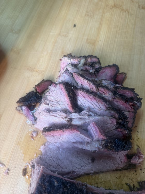 Slices of smoked brisket ready to serve